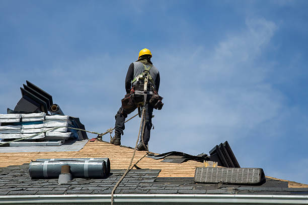 Professional Roofing technician working in Harrah, WA